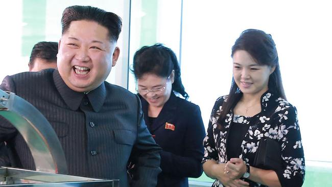 North Korean leader Kim Jong-un visits factory with wife Ri Sol-ju ...