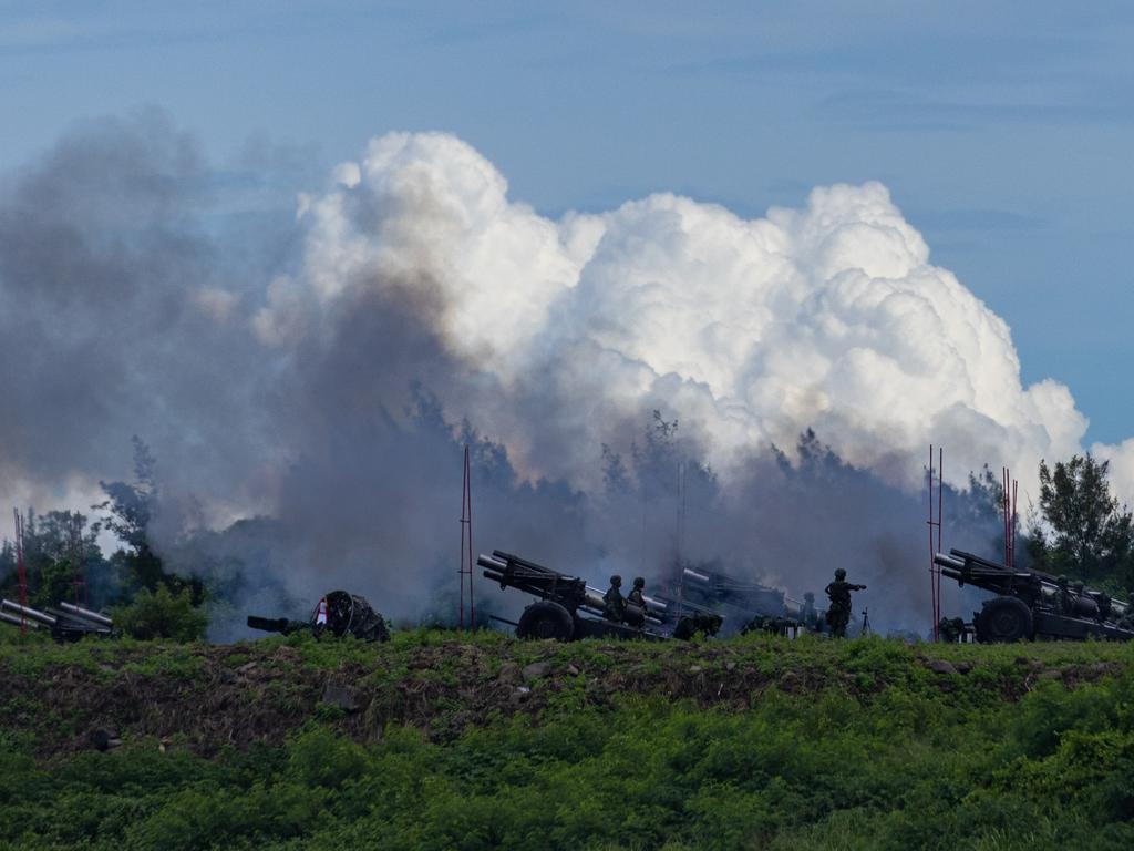 Taiwanese soldiers fire artillery during a live-fire drill.