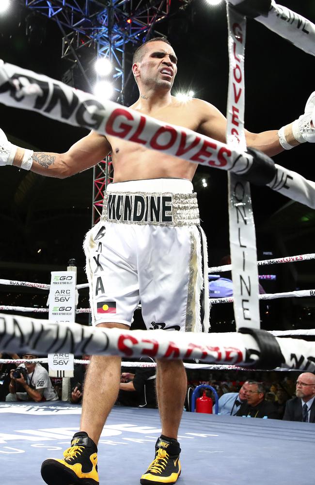 Mundine reacts to the crowd after a cheap shot on Green. Picture: Sarah Reed