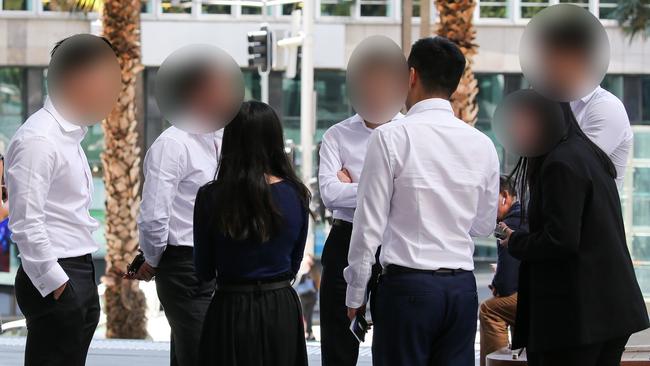 SYDNEY, AUSTRALIA - NewsWire Photos, NOVEMBER 16 2021:  Sydney siders wearing suits are seen getting coffee during lunch hour in the CBD, in Sydney. Picture: NCA Newswire / Gaye Gerard