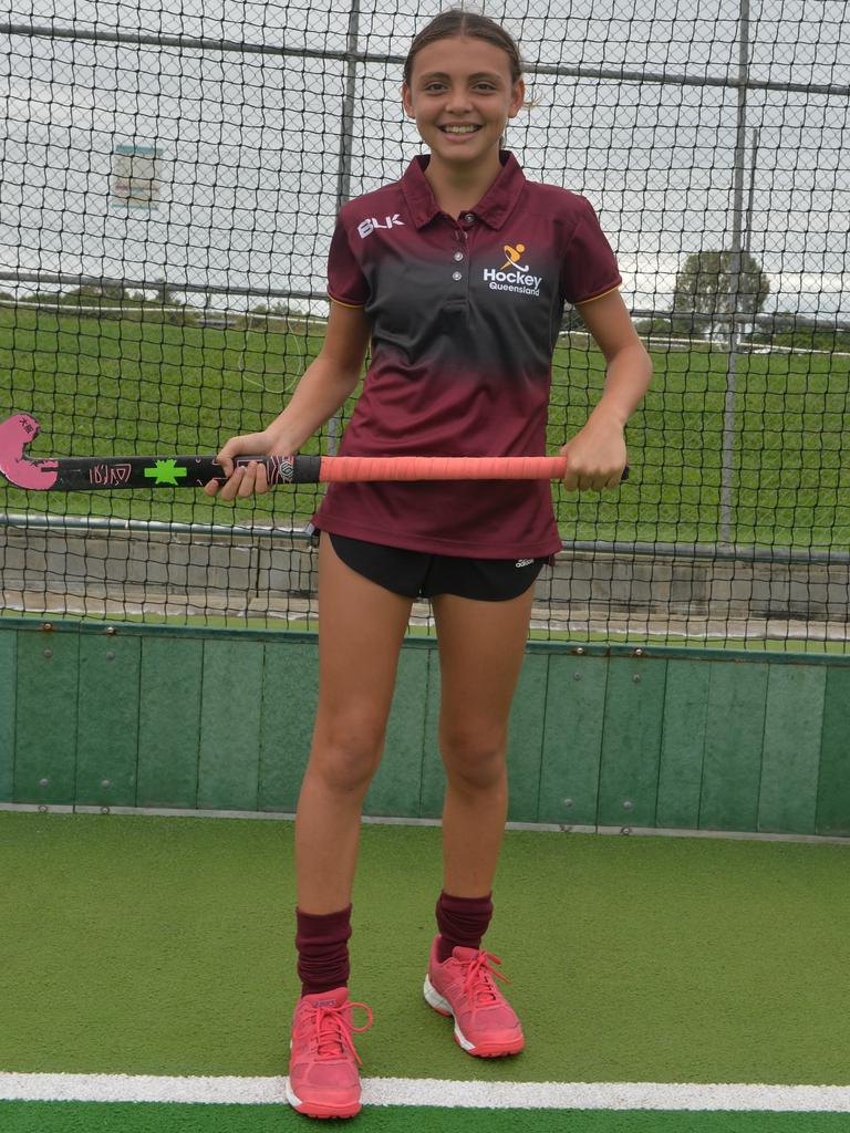 Jamie-lee Surha in her Maroon jersey for Queensland Under 15 girl's teams after being selected for the National hockey Championship next month.