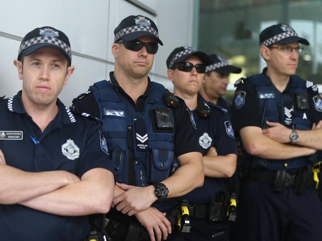 Eight unions at a rally due to EBA negotiations with the Gold Coast City Council which have been going on for six weeks. The group met at the corner of Bundall Rd and Crombie ave then marched on the Council Chambers at Evandale. Protestors on Bundall Rd. Police on standby.  Picture Glenn Hampson