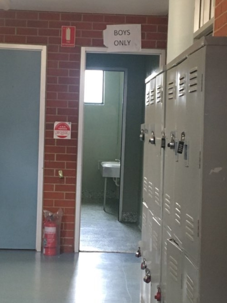 Toilet cubicles at Golden Grove High School can be seen from the halls following removal of external doors. Picture: Supplied