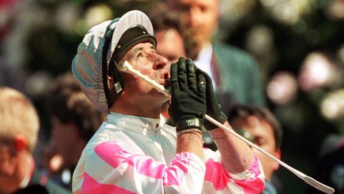 Horseracing - jockey Jim Cassidy praying showing gratitude riding racehorse Might And Power back to scale after winning 1997 Melbourne Cup race.  might/and/power
/Horseracing/Melbourne/Cup