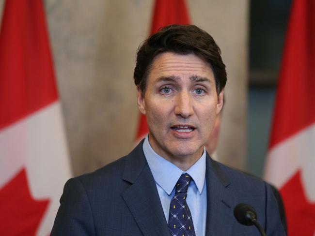 Canadian Prime Minister Justin Trudeau speaks during a press conference on October 14, 2024, on Parliament Hill in Ottawa, after Canada expelled six top Indian diplomats, including the country's ambassador. India and Canada each expelled the other's ambassador and five other top diplomats, after New Delhi said its envoy had been named among "persons of interest" following the 2023 murder of Canadian citizen Hardeep Singh Nijjar, a Sikh separatist leader. (Photo by Dave Chan / AFP)