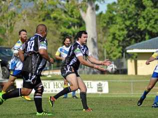 Lower Clarence Magpies' second-rower Alex McMillan eyes a gap in the defensive line. Picture: Leesa Kilduff