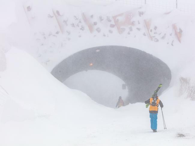 Huge snow falls at Mt Hotham block the road to Harrietville today. Picture: Karl Gray