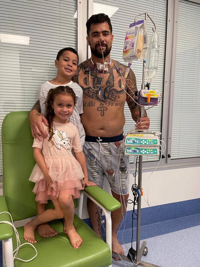 Fifita (right) after leaving intensive care.