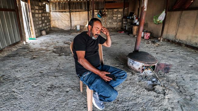 Mohamad Hassouna, whose seven-year-old daughter Amina was by shrapnel from an intercepted ballistic missile.px Ahmad Gharabli/AFP