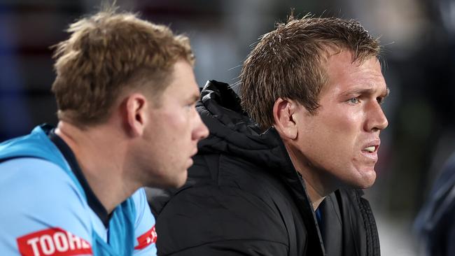 SYDNEY, AUSTRALIA - JUNE 05: Jake Trbojevic of the Blues looks on from the bench during game one of the 2024 Men's State of Origin Series between New South Wales Blues and Queensland Maroons at Accor Stadium on June 05, 2024 in Sydney, Australia. (Photo by Cameron Spencer/Getty Images)