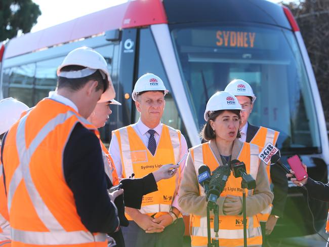 NSW Premier Gladys Berejiklian and Transport Minister Andrew Constance unveil the first vehicle. Picture: Tim Hunter.