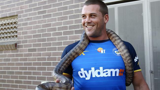 Pictured is Danny Wicks with a snake at a Parramatta Eels media call in Parramatta today. Picture: Tim Hunter.