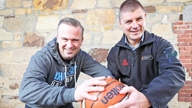 Chargers president David Bartlett and Basketball Tasmania chief executive Chris McCoy. Picture: Zak Simmonds