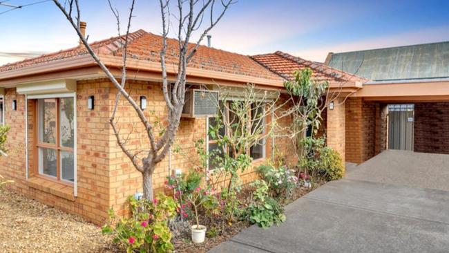 The concrete floor under the carport looks like it's two different colours in two separate photos. Picture: realestate.com.au