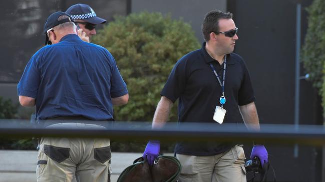 A saddle is taken at Weir’s Miners Rest stable, Ballarat, in the Australian Federal Police/Victoria Police raid.