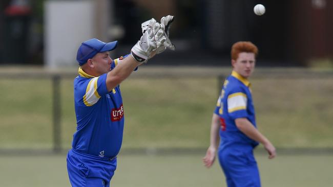 Anthony Quon in action with the gloves for Hampton in the Cricket Southern Bayside competition. Picture: Valeriu Campan