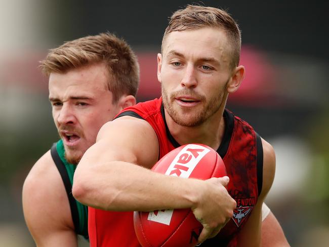 Devon Smith is tackled by Martin Gleeson at training. Picture: Getty Images