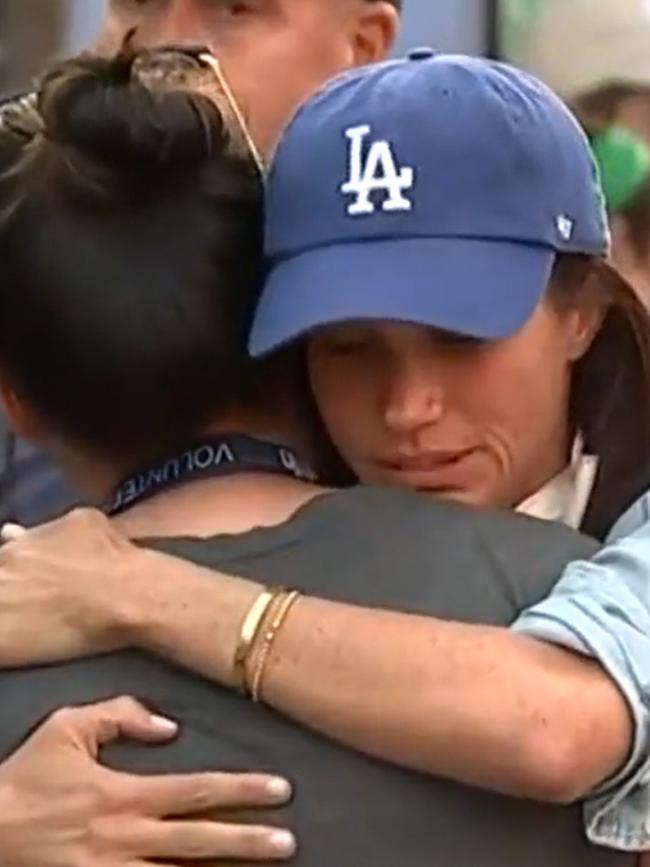 Meghan sparked divide among fans earlier this week when she was filmed hugging those impacted by the fires. Picture: CBS