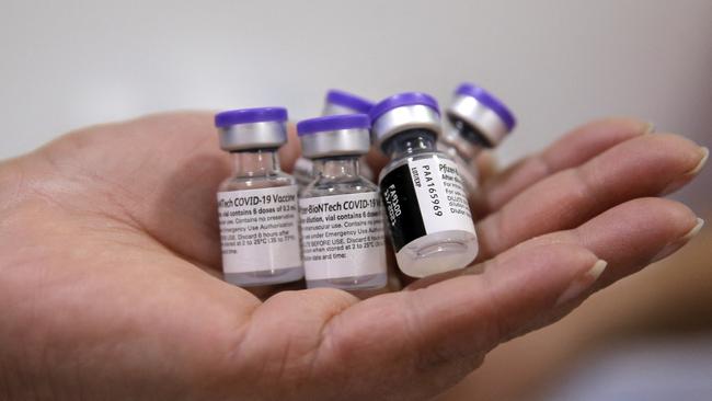 Demand is outstripping supply of the Pfizer vaccine. (Photo by JAVIER TORRES / AFP)