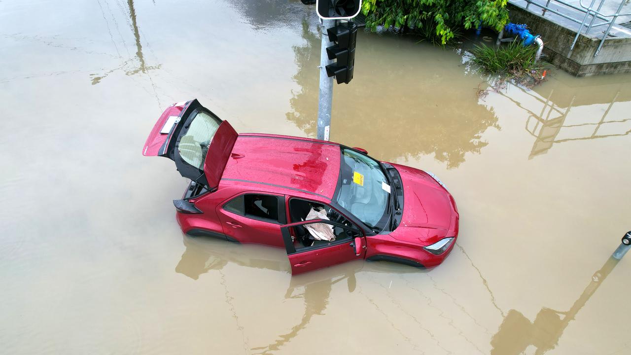 SES swamped, ‘intense’ flood threat as rain moves west; PM’s warning for insurance firms