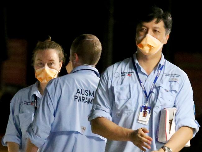 Teams from AUSMAT and the Australian Defence Force arrive at Christmas Island to meet the plane transporting Australian evacuees from Wuhan in China. Picture: Nathan Edwards