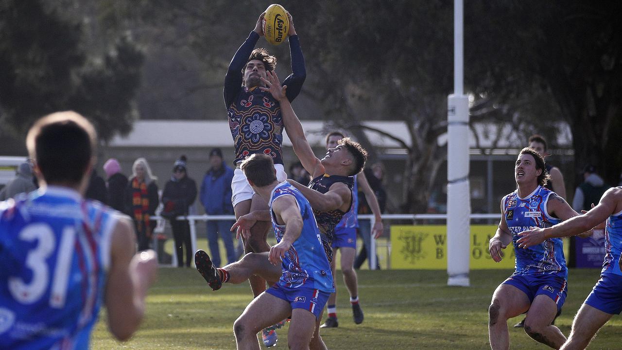 Shane McAdam holds a high mark during Adelaide's clash with Central District at Nuriootpa. Picture: Peter Argent