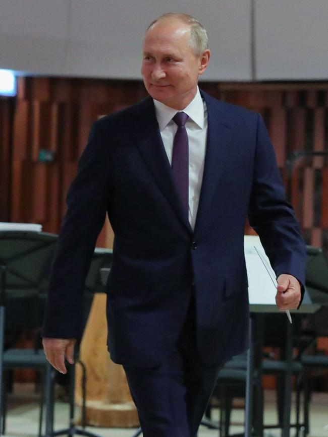 Russian President Vladimir Putin walks for a speech during the Moscow City Day celebrations on September 5.