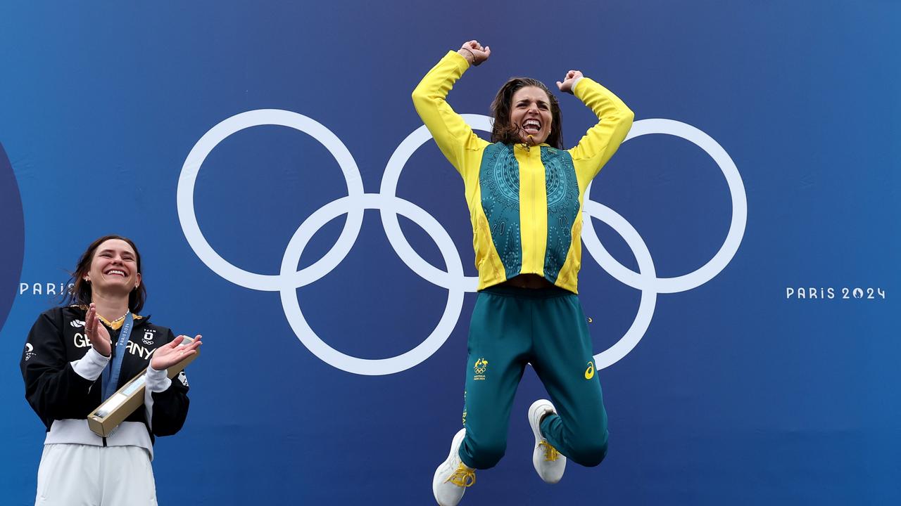 Gold medalist Jessica Fox of Team Australia celebrates on the podium during the Women's Canoe Slalom Single Final medal ceremony after the Canoe Slalom Women's Canoe Single Final on day five of the Olympic Games Paris 2024 at Vaires-Sur-Marne Nautical Stadium on July 31, 2024 in Paris, France. (Photo by Francois Nel/Getty Images)