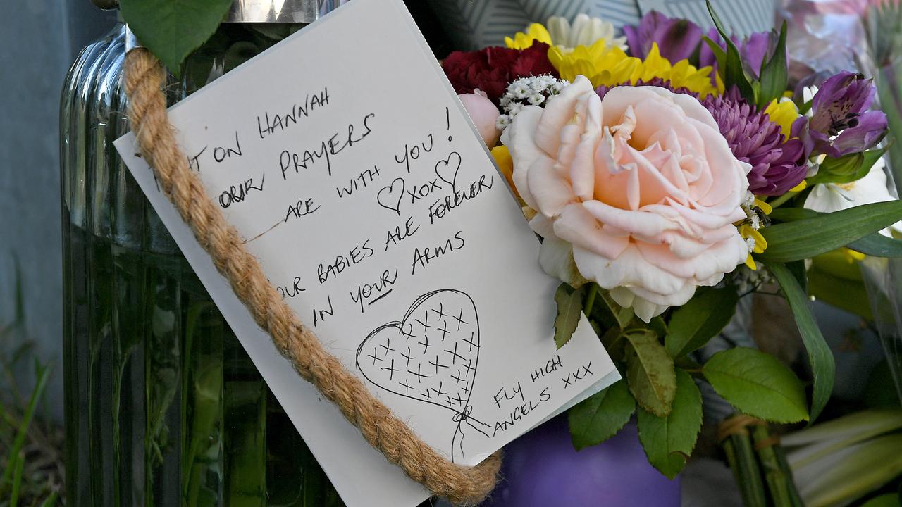 Flowers and cards left at the scene. Picture: John Gass/AAP