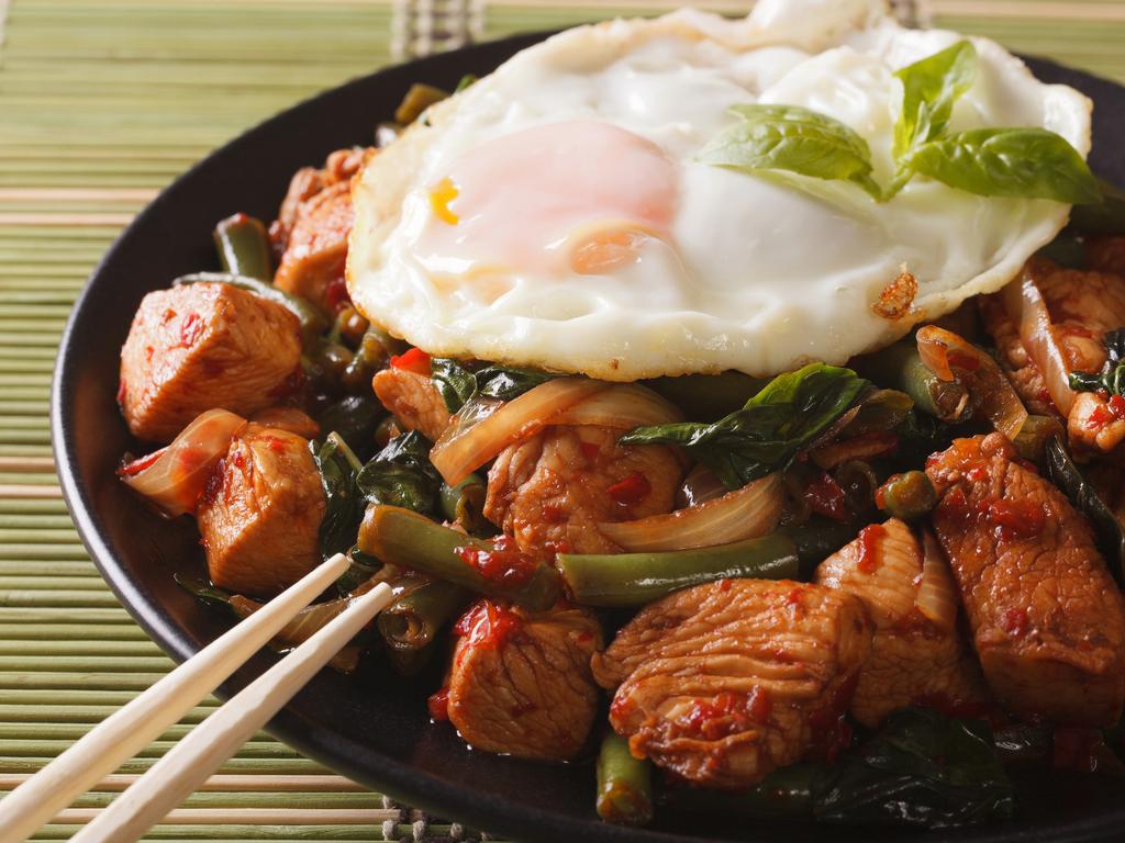 Thai dish Pad Krapow, chicken with basil and egg.