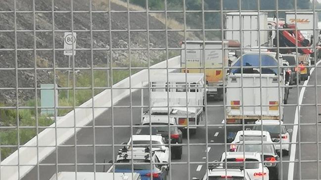 FIERY TRUCK CRASH: M1 Traffic chaos northbound.. after a B Double ran into 3 stationary roadworks trucks on M1 near Warnervale just after 2am. 5 men taken to hospital including the truck driver with shoulder injury and he will undergo mandatory testing. Picture: Twitter / Steve Hart