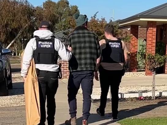 VIPER Taskforce arresting Trugg after allegedly seizing guns and drugs in a raid during an investigation into a firearm alleged to be linked to an outlaw motorcycle gang. Picture: Victoria Police.