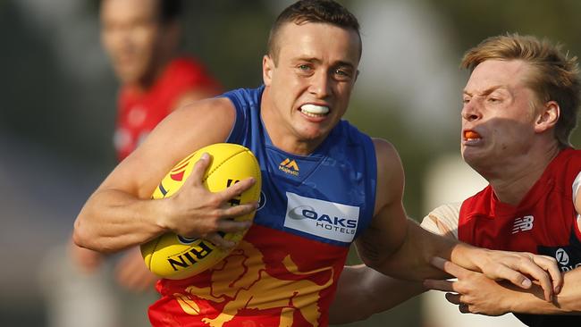 MELBOURNE, AUSTRALIA - MARCH 09: Lewis Taylor of the Lions runs with the ball during the 2019 JLT Community Series AFL match between the Melbourne Demons and the Brisbane Lions at Casey Fields on March 09, 2019 in Melbourne, Australia. (Photo by Darrian Traynor/Getty Images)