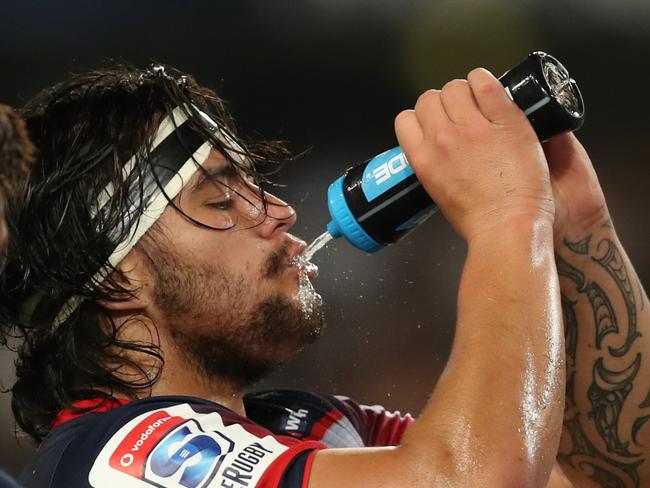 Melbourne Rebels prop Tyrel Lomax takes a break during the match against the Sharks in Durban. (Photo by Steve Haag/Gallo Images)