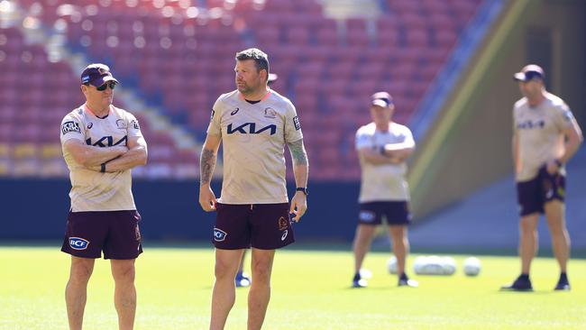 Kevin Walters, Lee Briers and the Broncos team train at Suncorp Stadium ahead of their semi-final against the Melbourne Storm on Friday. Pics Adam Head