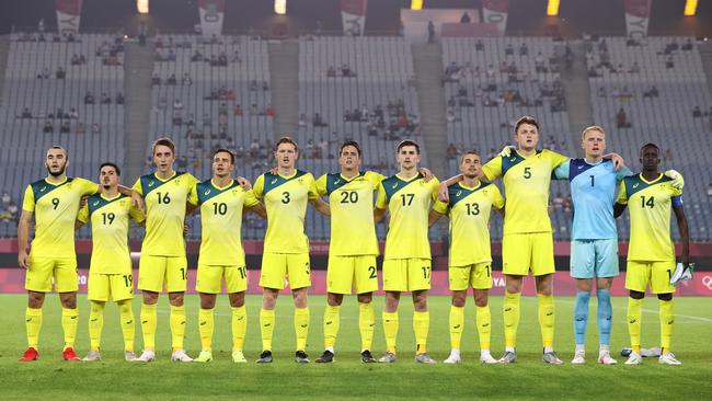 RIFU, MIYAGI, JAPAN - JULY 28: Players of Team Australia stand for the national anthem prior to the Men's Group C match between Australia and Eygpt on day five of the Tokyo 2020 Olympic Games at Miyagi Stadium on July 28, 2021 in Rifu, Miyagi, Japan. (Photo by Koki Nagahama/Getty Images)