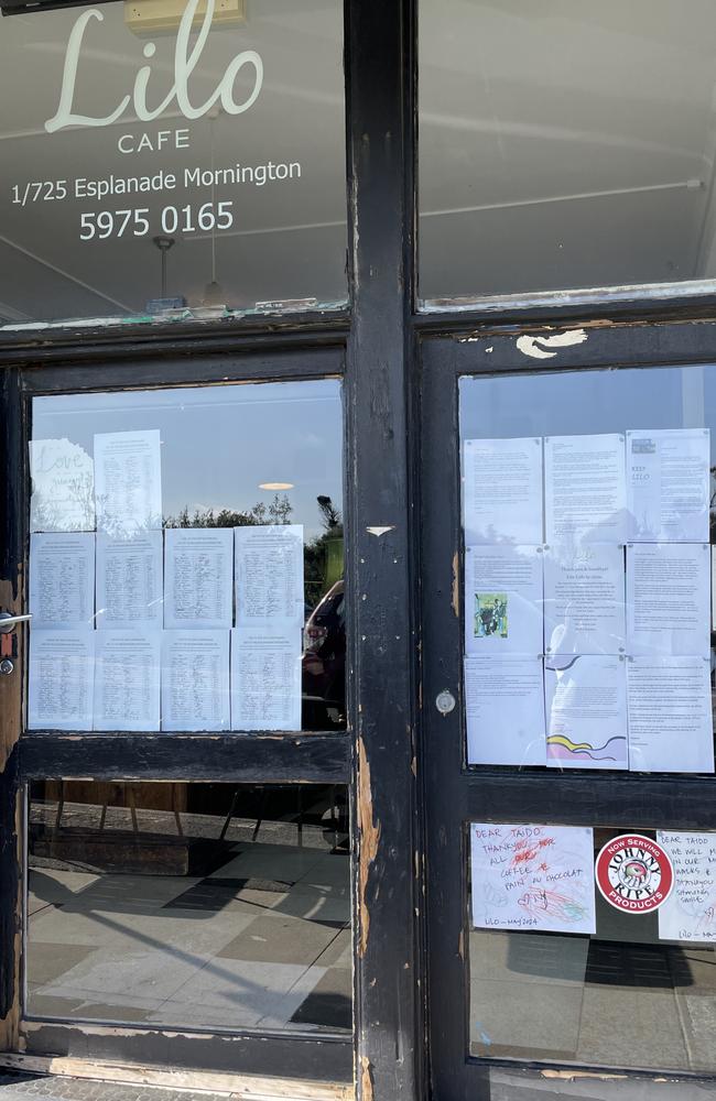 Petition sheets signed by locals lobbying the landlord to renew the cafe lease. Picture: Lucy Callander