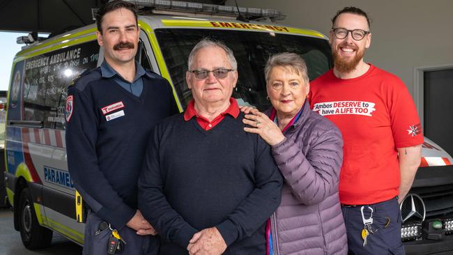 Brendan McDaid with wife Kathy meeting paramedics Chris Wilkinson and Michael Walker who saved his life after he went into cardiac arrest a year ago. Picture: Brad Fleet