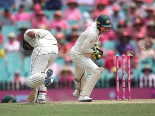 Tim Paine catches the Kiwis short.