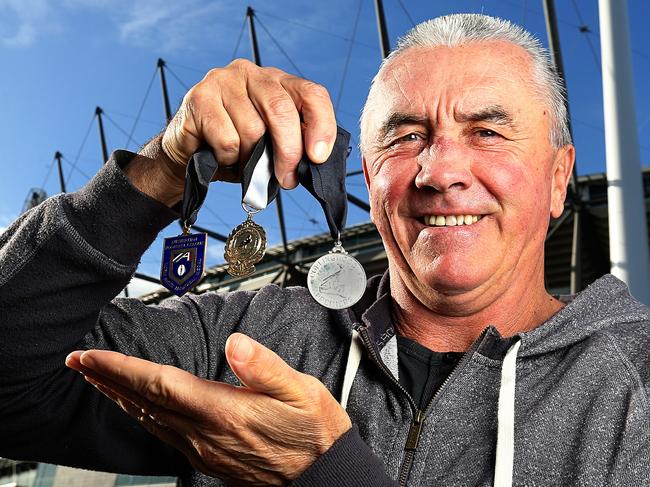 Collingwood Champ, Tony Shaw with his 1990 best-and-fairest, Copeland and Norm Smith Medal. Picture: Tim Carrafa