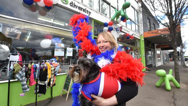 Fiona Adams and Lolly the dog who work at Dog Diversity in Seddon and are all about the Bulldogs. Picture: Ellen Smith