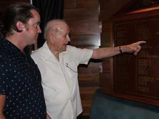 REMEMBERING: Inspecting the restored Roll of Honour Board for 1939-1945 at the Currumbin RSL is Tyson Dolan whose grandfather Stan Dolan is on the board and Dan Waters who is also on the board.