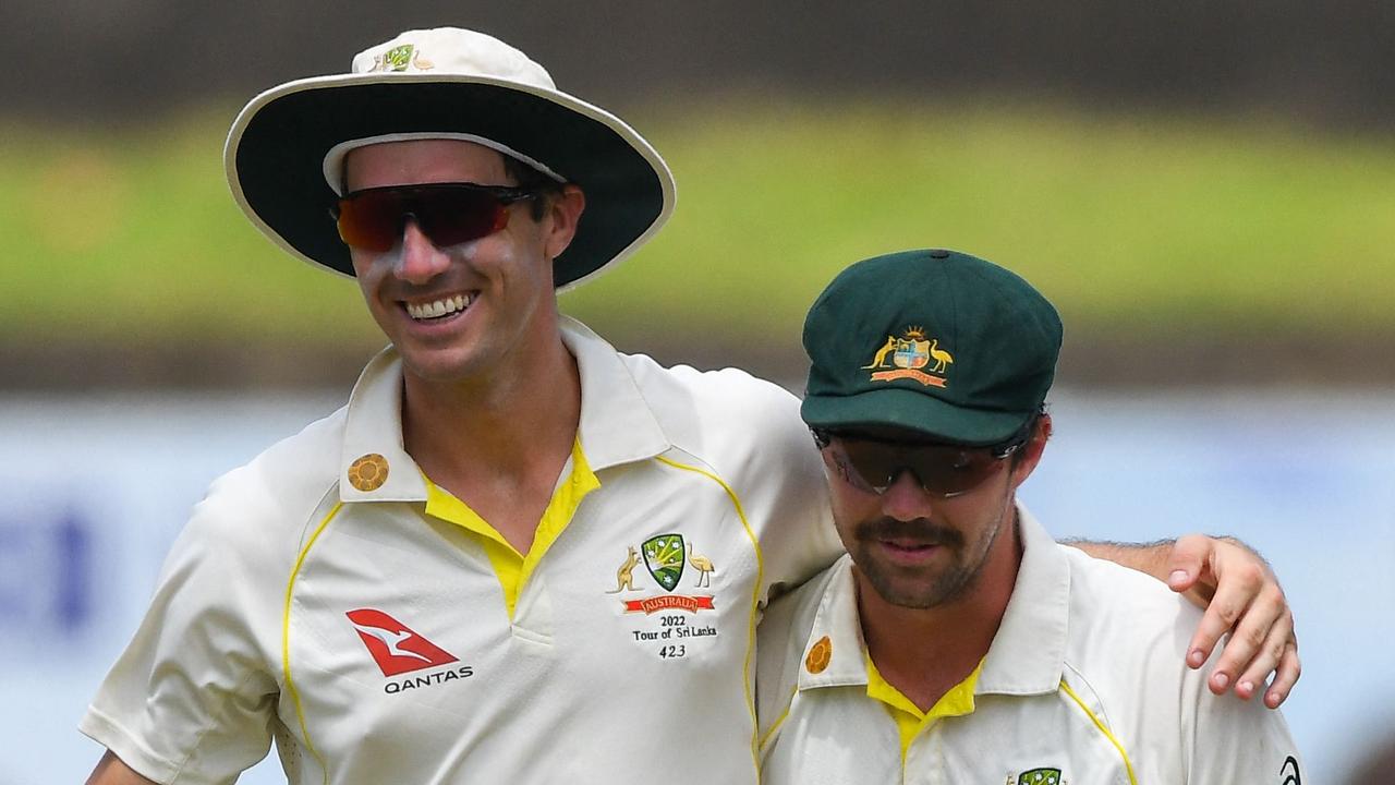 Pat Cummins celebrates with unlikely second innings destroyer, Travis Head. Picture: AFP