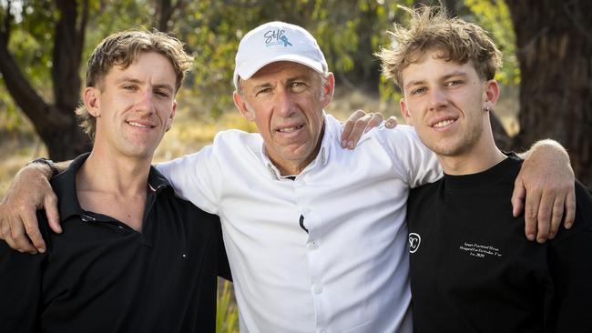 Scott Harris and his sons Sam (LHS) and Luke at Acton Park. Picture: Chris Kidd