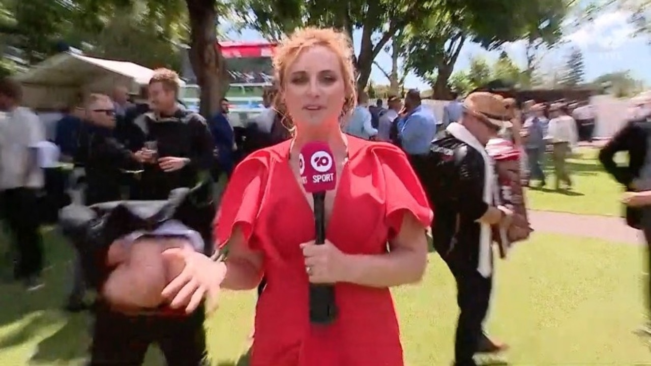 This Channel 10 reporter was just trying to do her job as she reported live from Ascot in Perth on Melbourne Cup day. Picture: Channel 10