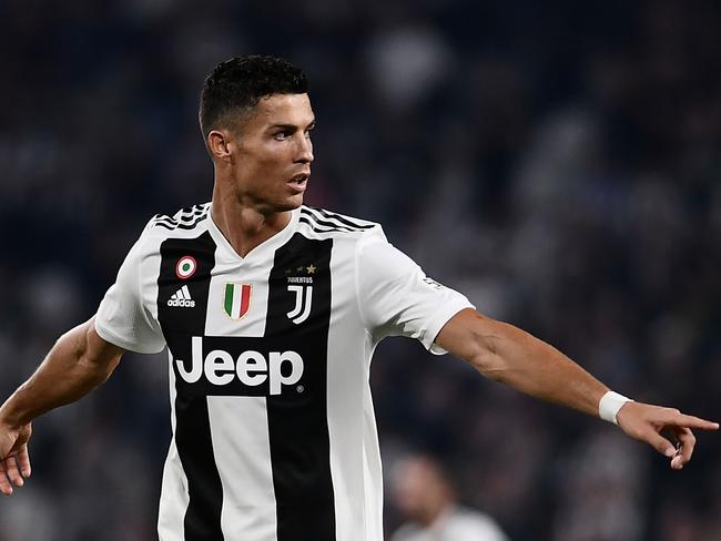 Juventus' Portuguese forward Cristiano Ronaldo gestures during the Italian Serie A football match Juventus vs Napoli on September 29, 2018 at the Juventus stadium in Turin. (Photo by Marco BERTORELLO / AFP)