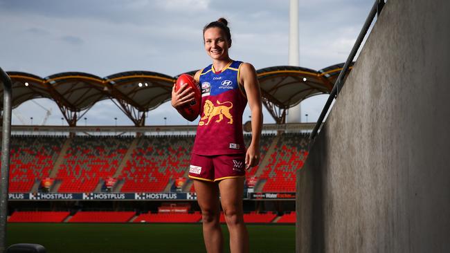 Emily Bates and the Brisbane Lions AFLW have their Captains run at Metricon Stadium. Pics Adam Head