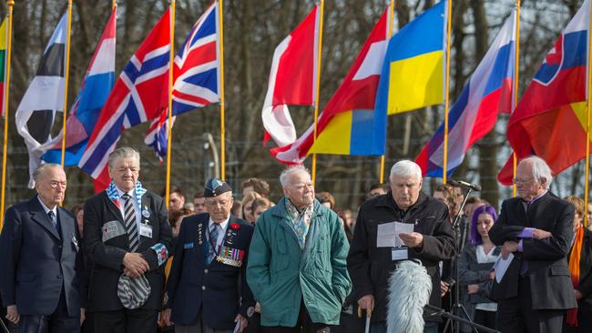Holocaust survivor Boris Romantschenko, second from the right, as he stands next to other former prisoners of the Buchenwald Nazi concentration camp in Germany. Picture: AFP.