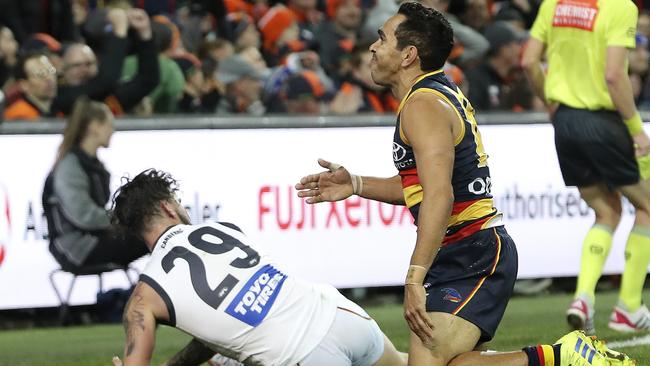 Eddie Betts celebrates with fans — as Zac Williams looks helplessly from the ground — after his Round 12 stunner. Picture SARAH REED