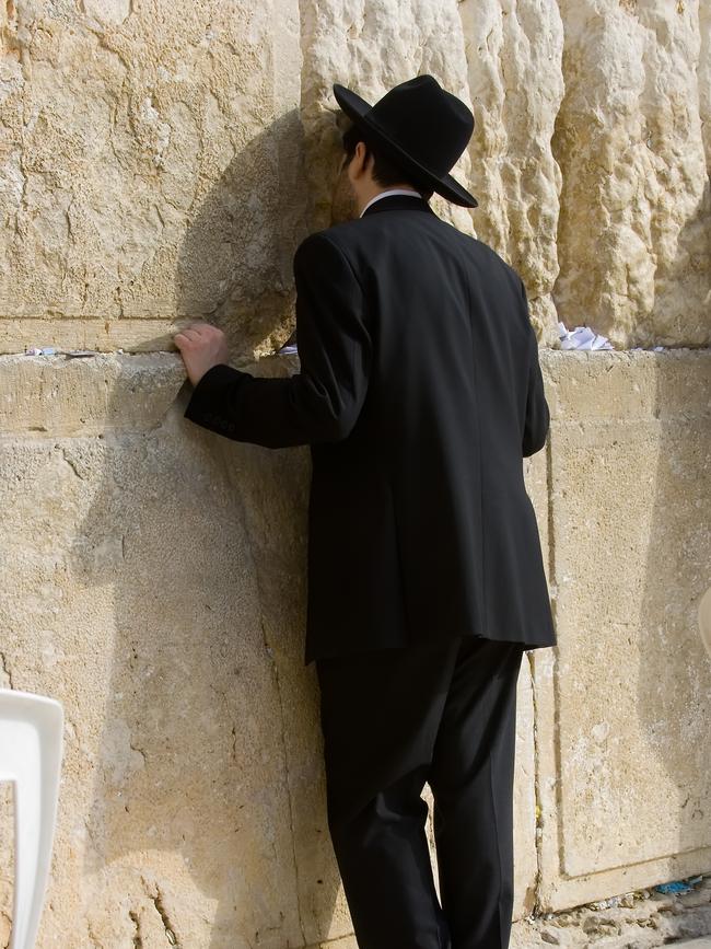 A worshipper at the Western Wall.